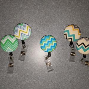 Chevron badge reels