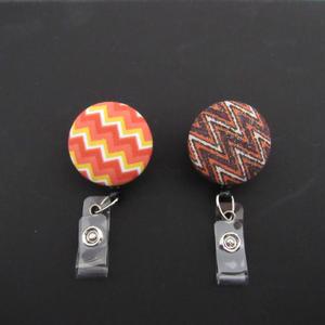 Chevron badge reel to use to display/wear your ID at work or school. Choose swivel clip or belt clip and color you like!
