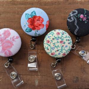 Floral design badge reel