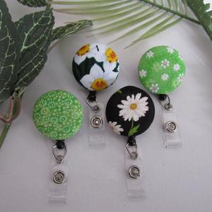 Fun greenish floral badge reels