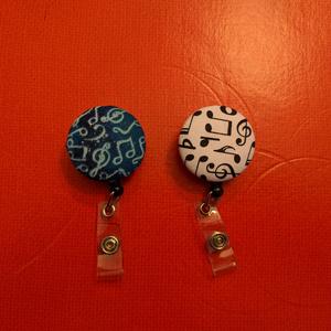 Musical notes badge reel