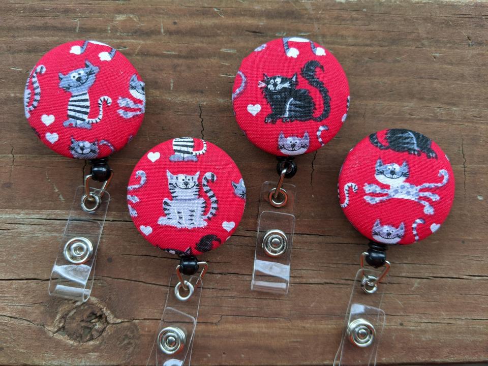 Cat badge reels