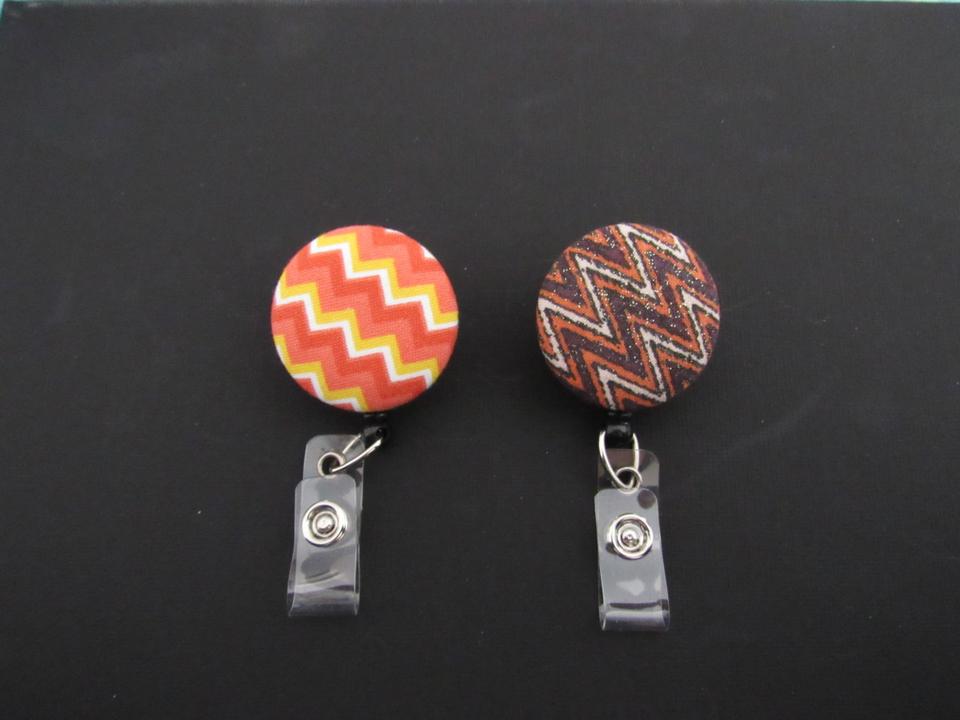 Chevron badge reel to use to display/wear your ID at work or school. Choose swivel clip or belt clip and color you like!