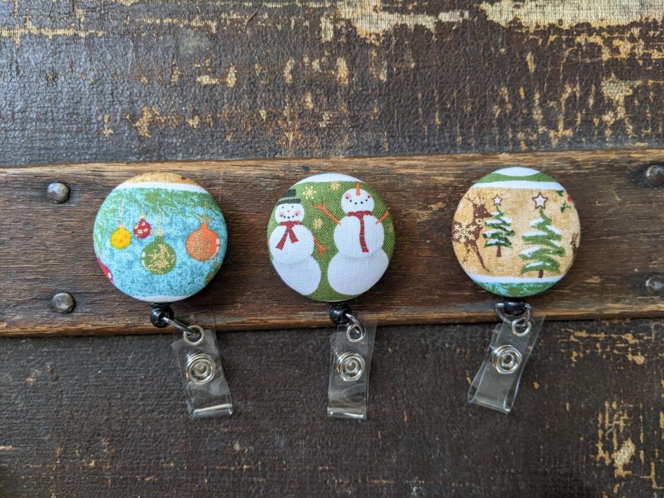 Christmas themed badge reels for work or school.