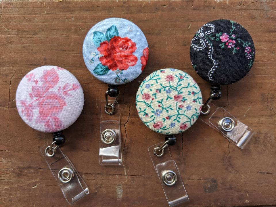 Floral design badge reel