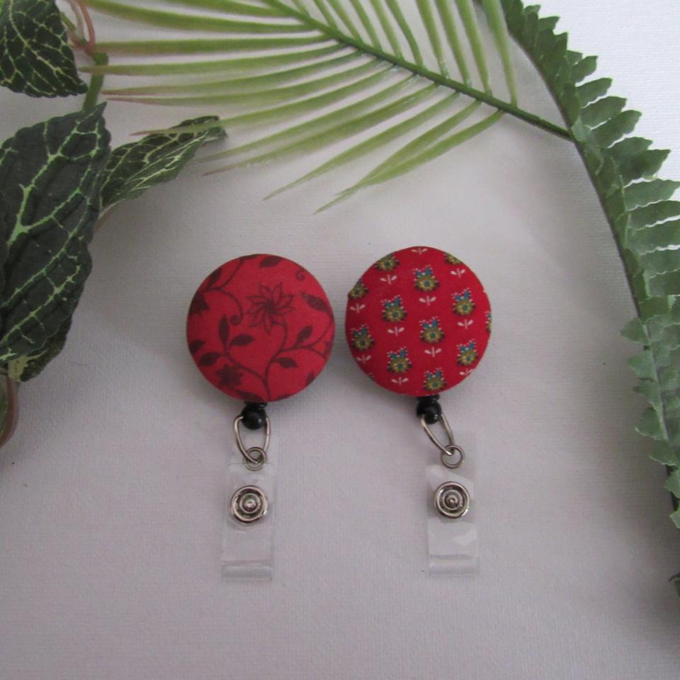 Red Floral badge reels