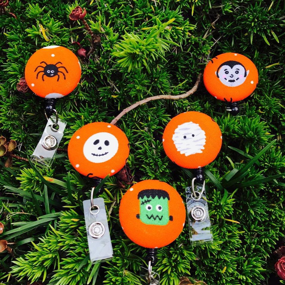 Fun Orange Halloween Character Badge reels for work or school!