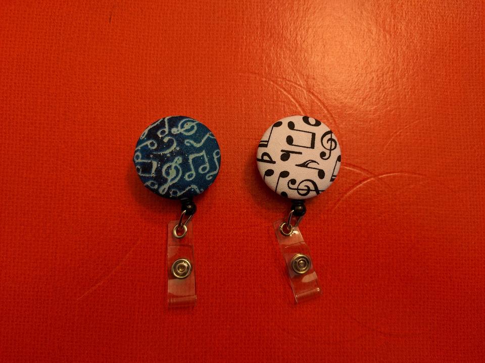 Musical notes badge reel
