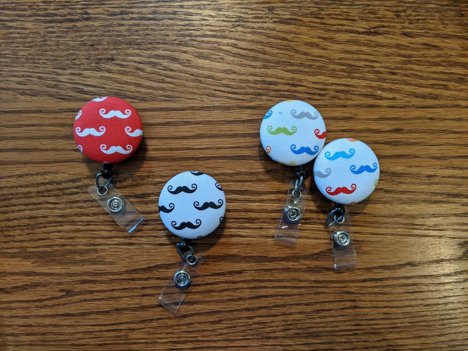 Mustache Badge reels for work or school IDs