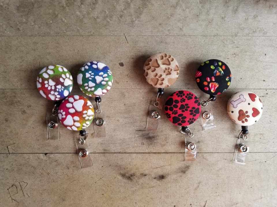 Paw print badge reel for animal lovers to wear at work or school!