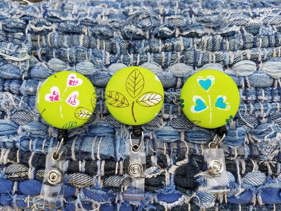 Plant and heart badge reels for work or school IDs