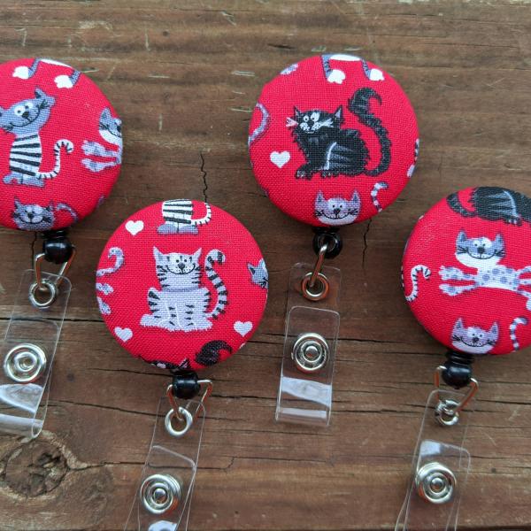 Cat badge reels
