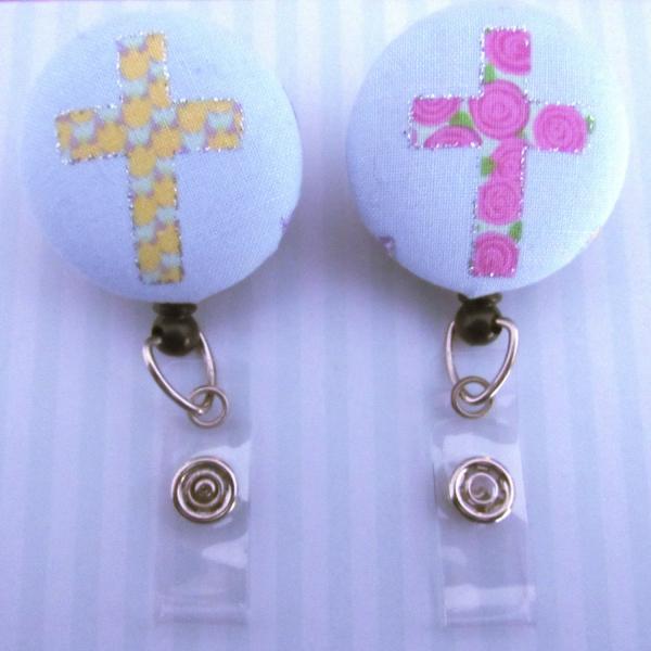 Cross badge reels