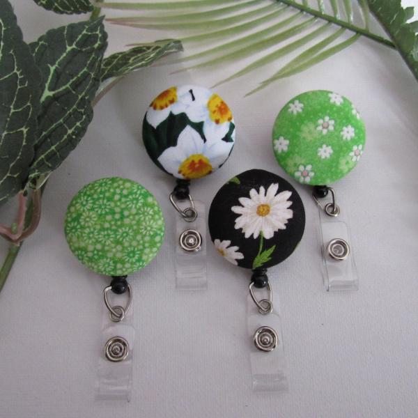 Fun greenish floral badge reels