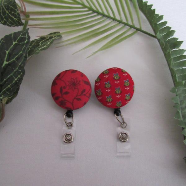 Red Floral badge reels