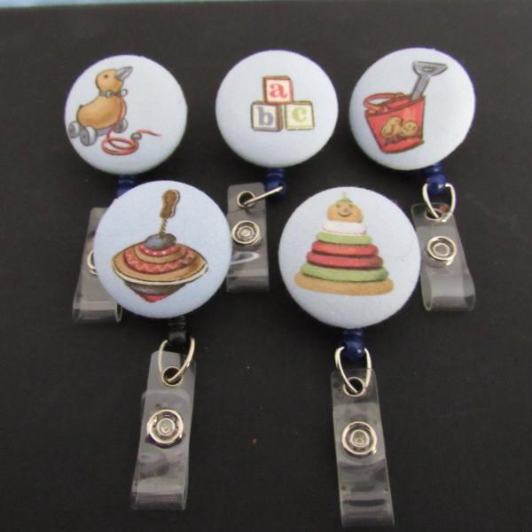 Vintage toy  badge reel