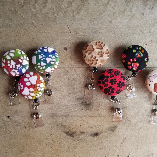 Paw print badge reel for animal lovers to wear at work or school!